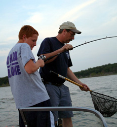 Al - Point 12 - nets a walleye for a teenage customer